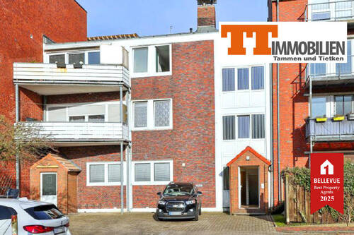 Außenansicht - TT bietet an: Gut vermietetes Wohn-Geschäftshaus mit 10 PKW-Stellplätzen in der Innenstadt!
