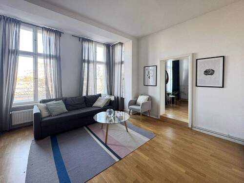 Wohnzimmer - Zwei Bereiche – unendliche Möglichkeiten: 6-Zi-Whg in Bestlage