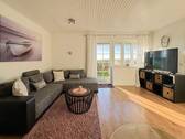 Wohnzimmer mit Austritt Terrasse Süden.jpg - 7 Zimmer Einfamilienhaus zum Kaufen in Sylt