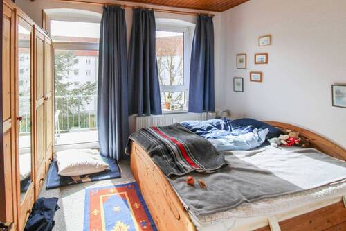 Schlafzimmer mit Balkon - 