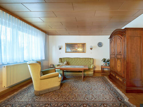 Wohnzimmer Ansicht 2 - Einfamilienhaus mit 132,20 m&sup2; in Karlsruhe / Neureut zum Kaufen