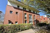 Hauseingang Rückseite - 2 Zimmer Etagenwohnung zum Kaufen in Lübeck