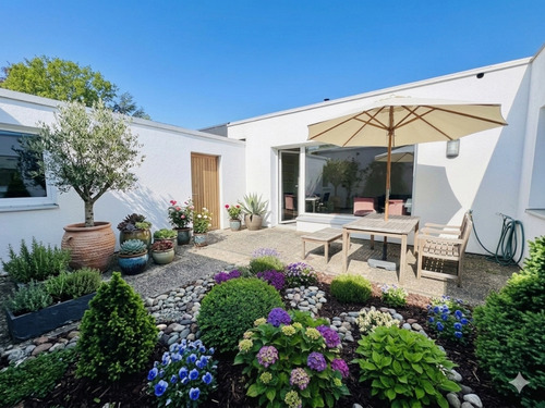 Atrium Musterfoto - Wohnen ohne Stufen: Teilmodernisiertes Bungalow-Juwel mit Garage und viel Potenzial!