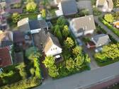Luftbild - Ruhig gelegenes Einfamilienhaus mit zwei Garagen in Barmstedt zu verkaufen