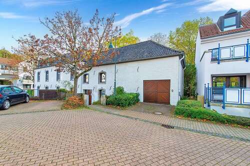 Immobilie-Aachen-Haus-kaufen-ID060-1 - PHI AACHEN - Raumwunder mit großzügigem Süd-Garten und Garage im Herzen von Laurensberg!