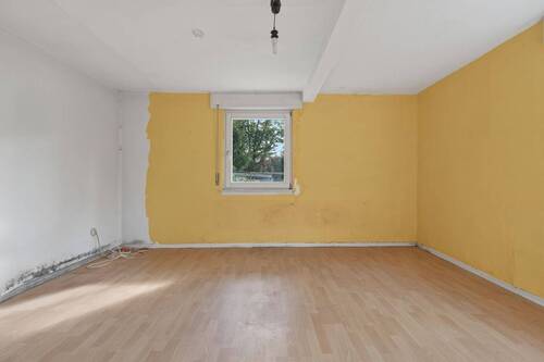 Wohnzimmer - Einfamilienhaus mit 65,00 m² in Karlsruhe / Hagsfeld zum Kaufen