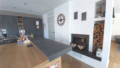 Kamin zwischen Küche und Wohnzimmer EG - 