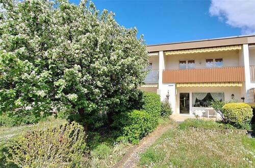 Haus Gartenseite - Charmantes Reihenmittelhaus mit Garten, Terrasse und Garage