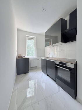 Bild 1 - Helle und moderne 2 Zi. Whg 47Qm Küche Keller