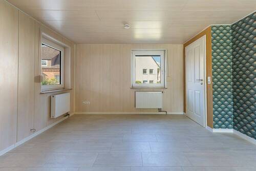 Wohnzimmer - Reihenendhaus mit 57,00 m² in Lauenburg/Elbe zum Kaufen