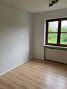 Zimmer mit Laminatboden - 