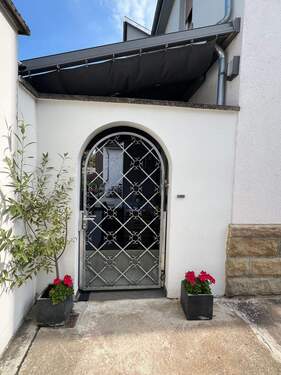 Seiteneingang zu Haus - 