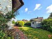 Vorderer Garten mit Gartenhaus - 5 Zimmer Einfamilienhaus zum Kaufen in Vellmar / Obervellmar