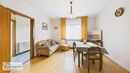 Wohnzimmer EG - Einfamilienhaus mit 136,00 m² in Losheim am See / Britten zum Kaufen