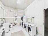 Waschmaschinenraum mit Platz für jede Wohnung - 