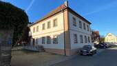Gebäuderückseite.jpeg - Mehrfamilienhaus, Wohnhaus in Geldersheim
