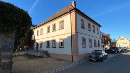 Gebäuderückseite.jpeg - Mehrfamilienhaus, Wohnhaus in Geldersheim