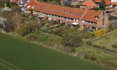 Ansicht von Südost - Reihenendhaus mit 125,00 m&sup2; in Rostock zum Kaufen