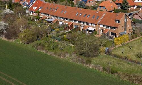 Ansicht von Südost - Reihenendhaus mit 125,00 m&sup2; in Rostock zum Kaufen