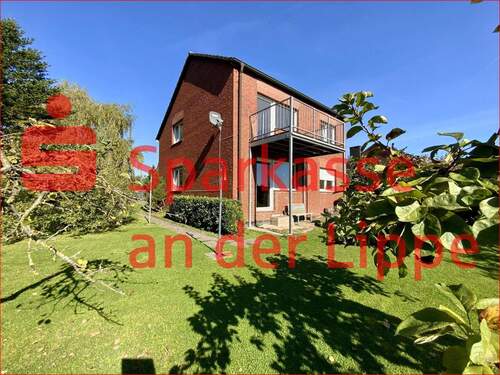 Hausansicht Gartenseite - Werne-Nibelungenring: Ein- bis Zweifamilienhaus auf traumhaftem Grundstück in der Nähe des Dornbergs