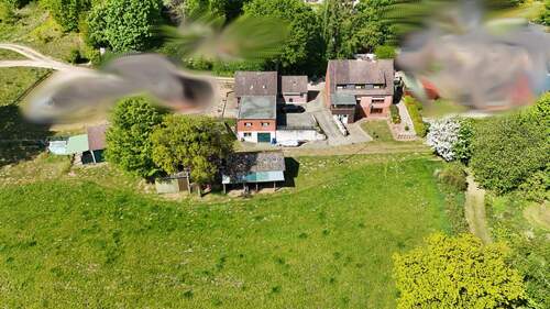  Drohne Rückansicht.JPG - 8 Zimmer Mehrfamilienhaus, Wohnhaus zum Kaufen in Westensee
