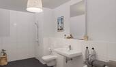 Modern gefliestes Badezimmer mit bodengleicher Dus - 2 Zimmer Etagenwohnung in Aachen