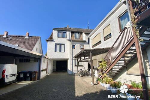 Hofansicht - 1 Zimmer Mehrfamilienhaus, Wohnhaus zum Kaufen in Rüsselsheim