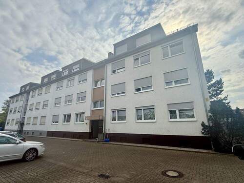 Frontansicht - Charmante 3-Zimmer-Dachgeschosswohnung mit Südwest-Terrasse