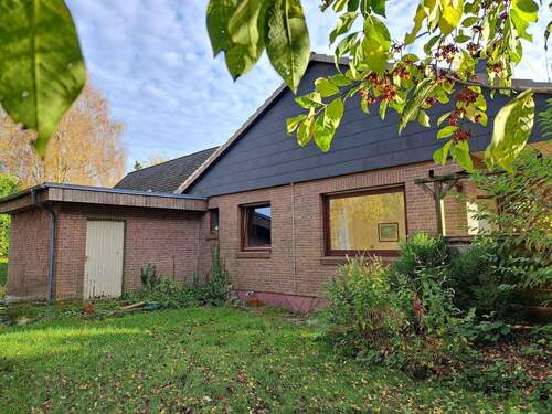 Giebelansicht mit Werkstatt - Mehrfamilienhaus, Wohnhaus mit 110,00 m² in Winseldorf zum Kaufen