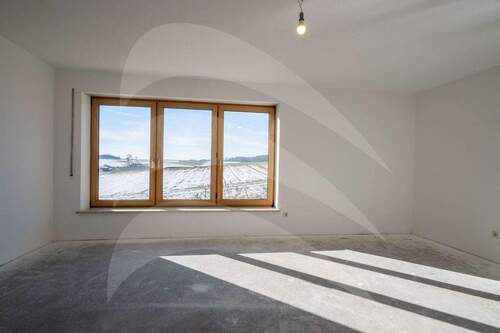 Wohnzimmer - 6 Zimmer Einfamilienhaus zum Kaufen in Weihmichl