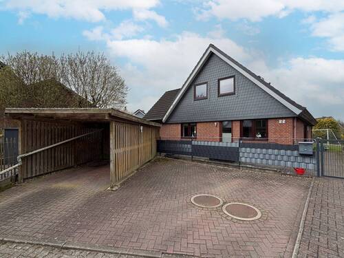 Haus mit Carport - 5 Zimmer Einfamilienhaus zum Kaufen in Holm