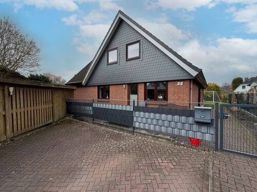 Hausansicht - Einfamilienhaus mit 156,60 m&sup2; in Holm zum Kaufen