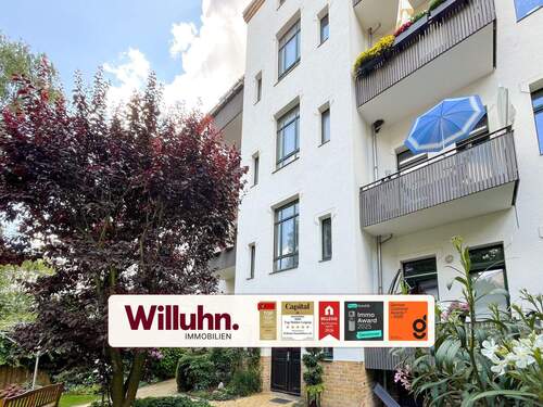 Außenansicht - Attraktive Dachgeschosswohnung in begehrter Wohnlage mit ruhiger Umgebung