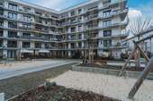 Außenansicht - Wohnen am Park: Exklusive 3-Zimmer-Neubau-Wohnung !!Erstbezug!! mit eigenem Tiefgaragenstellplatz und E-Ladestation