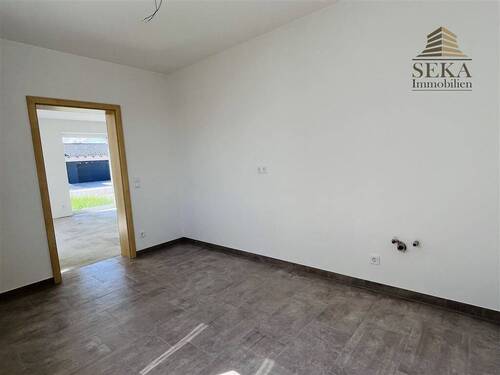Küchenbereich mit Blick in Wohnbereich - 
