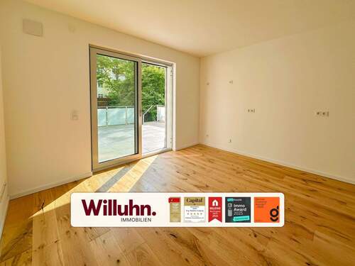 Küche mit Terrassenzugang - Neubauwohnung mit privatem Gartenanteil und ca. 28 m² großer Terrasse - provisionsfrei