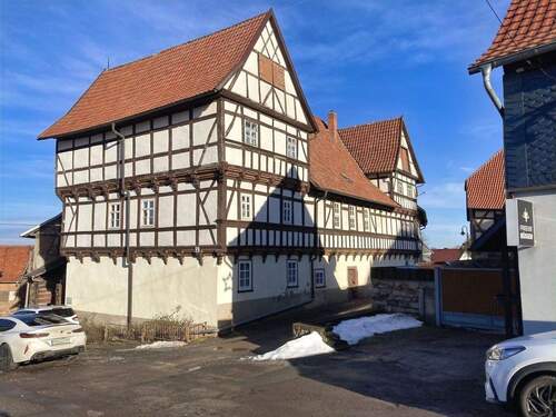 Seitenansicht - 1 Zimmer Mehrfamilienhaus, Wohnhaus zum Kaufen in Auleben