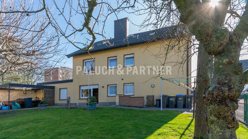 Hausansicht - 9 Zimmer Mehrfamilienhaus, Wohnhaus zum Kaufen in Beckum