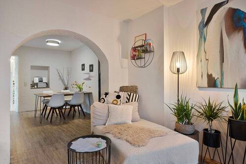 Wohnzimmer mit Blick Essbereich Erdgeschoss - Mehrfamilienhaus, Wohnhaus mit 143,00 m² in Hürth zum Kaufen