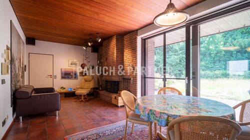 Kaminzimmer mit Essecke - 5 Zimmer Bungalow in Paderborn