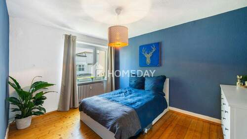 1. OG Schlafzimmer 1 - 