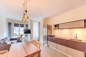 Wohnkueche - AIGNER - Mitten in der City: Apartment in zentraler Lage