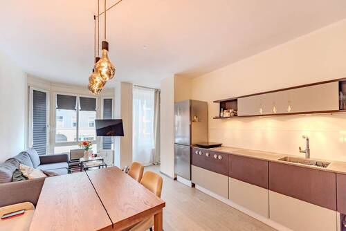 Wohnkueche - AIGNER - Mitten in der City: Apartment in zentraler Lage