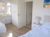 Schlafzimmer im Erdgeschoss - 4 Zimmer Etagenwohnung in Sylt