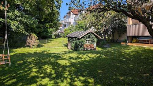 Gartenblick nach Westen - 1 Zimmer Mehrfamilienhaus, Wohnhaus in Rosenheim