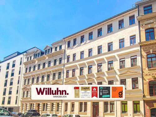 Blick auf Mehrfamilienhaus - Modern wohnen im Erstbezug 