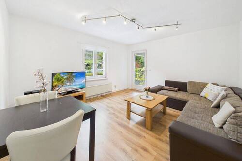 EG Ferienwohnung Wohnzimmer - Mehrfamilienhaus, Wohnhaus mit 231,80 m² in Bernkastel-Kues zum Kaufen