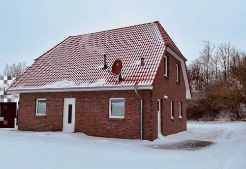 Außenansicht vorne - Modernes Einfamilienhaus mit Garten in Oldenburg i. H. zu vermieten