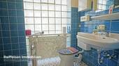 RAIBA IMMO - Wohnen am Sonnenhang 1 - WC blau - 