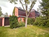 Gartenansicht - Gemütliches, sehr gepflegtes und teilweise modernisiertes Reihenhaus mit großen Garten und Garage
